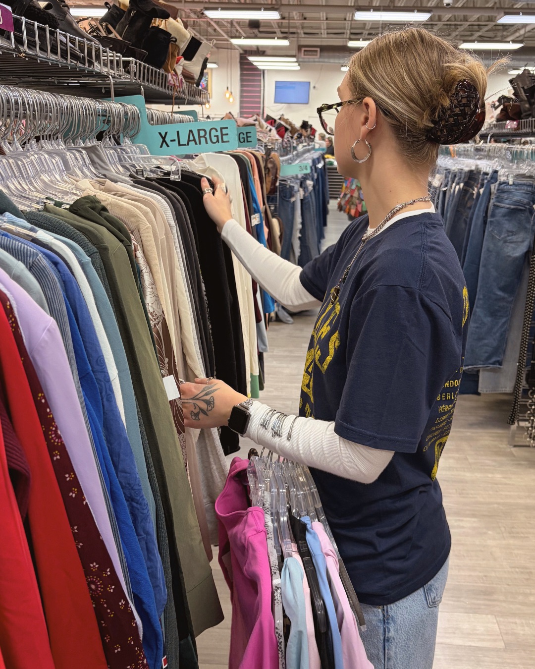 Picture of employee putting items away on the sales floor
